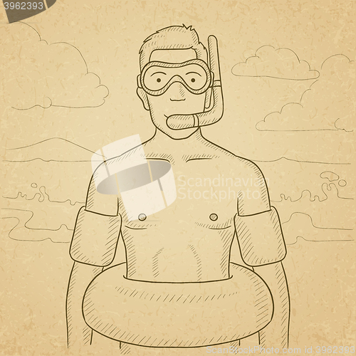 Image of Man with swimming equipment.