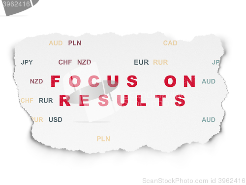 Image of Business concept: Focus on RESULTS on Torn Paper background