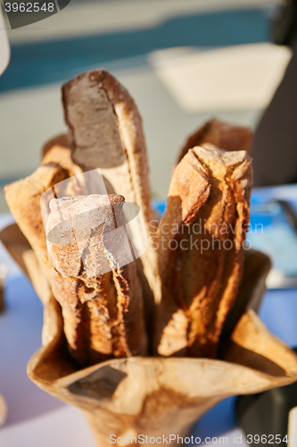 Image of Traditional crusty French baguette bread in baskets