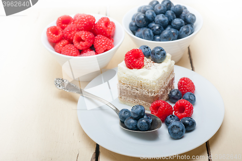 Image of fresh raspberry and blueberry cake