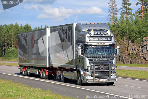 Image of Scania R560 Truck and Trailer on Summer Freeway