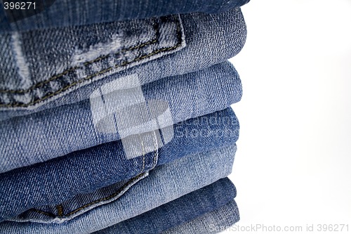 Image of stask of blue jeans