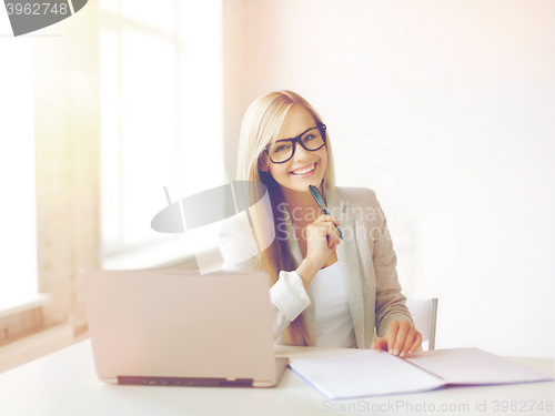 Image of businesswoman with documents