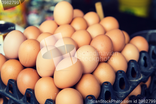 Image of fresh eggs on tray at asian street market