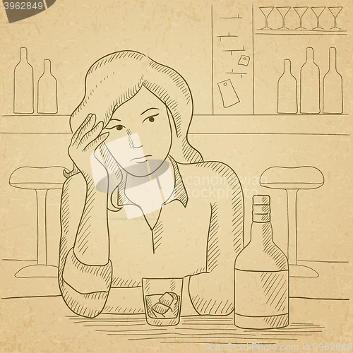 Image of Woman sitting at bar.