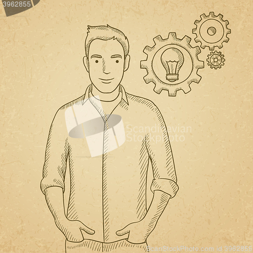 Image of Man with bulb and gears.