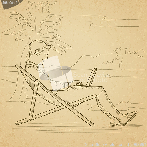 Image of Businessman sitting in chaise lounge with laptop.