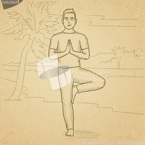 Image of Man practicing yoga.