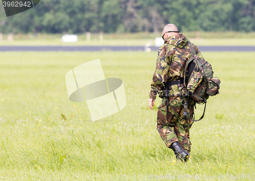 Image of LEEUWARDEN, THE NETHERLANDS - JUNE 9; Military guard walking at 