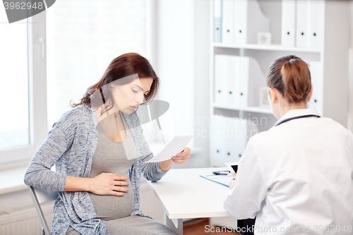 Image of gynecologist doctor and pregnant woman at hospital