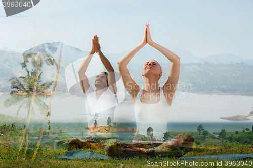 Image of smiling couple making yoga exercises outdoors