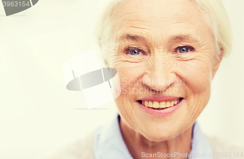 Image of happy senior woman face at home