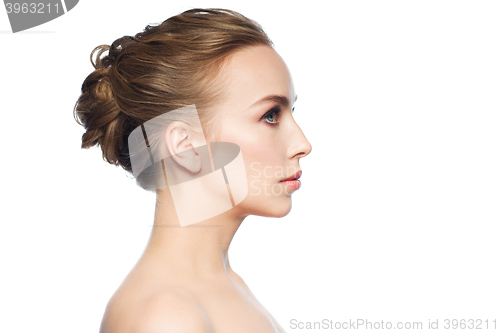 Image of beautiful young woman face over white background