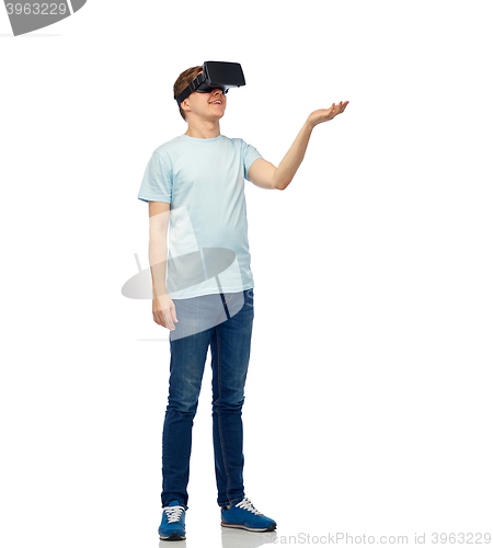 Image of happy man in virtual reality headset or 3d glasses