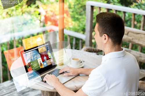 Image of close up of businessman with laptop on terrace