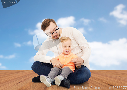 Image of happy father and little son