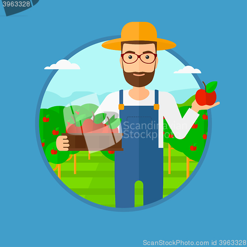 Image of Farmer collecting apples.