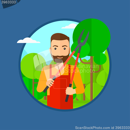 Image of Farmer with pruner in garden.