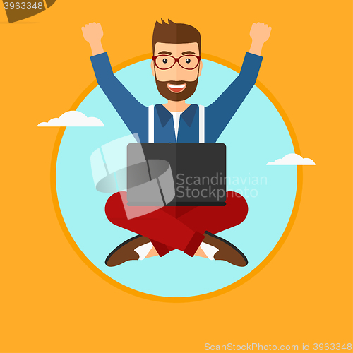Image of Man sitting on cloud with laptop.