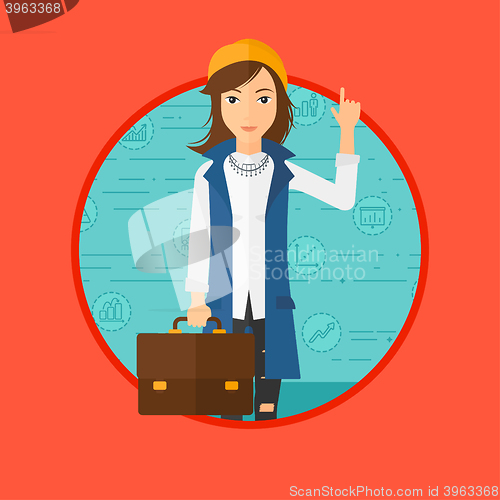 Image of Business woman pointing at cogwheels.