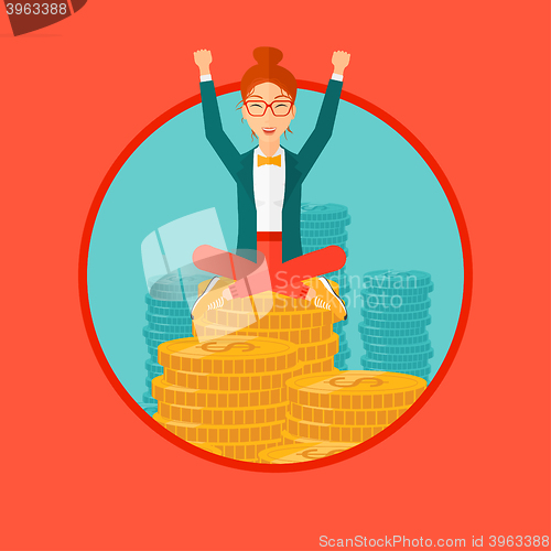 Image of  Happy business woman sitting on coins.