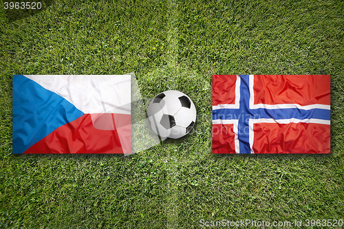 Image of Czech Republic vs. Norway flags on soccer field