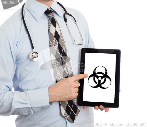 Image of Doctor holding tablet - Warning! Biohazard!