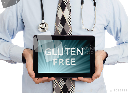 Image of Doctor holding tablet - Gluten free