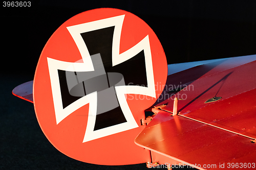 Image of Close-up of an old german triplane, iron cross painting