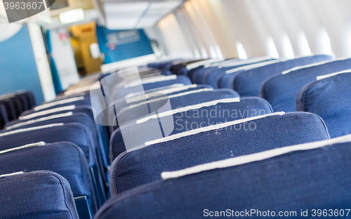 Image of Empty old airplane seats in the cabin, selective focus