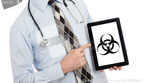 Image of Doctor holding tablet - Warning! Biohazard!