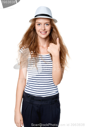 Image of Happy woman with straw hat