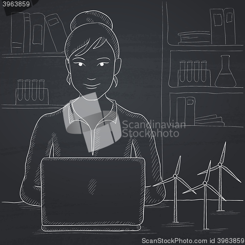 Image of Woman working at laptop. 
