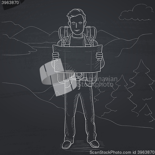 Image of Backpacker looking at map.