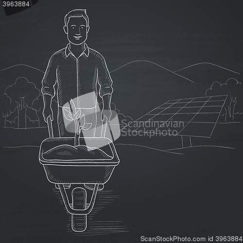 Image of Man with plant and wheelbarrow.