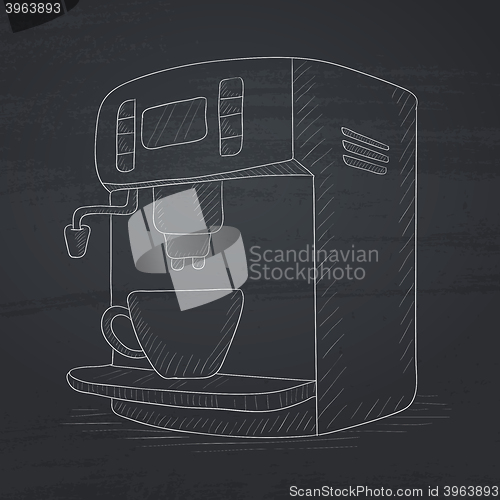 Image of Coffee maker with cup.