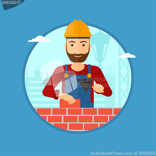 Image of Bricklayer with spatula and brick.