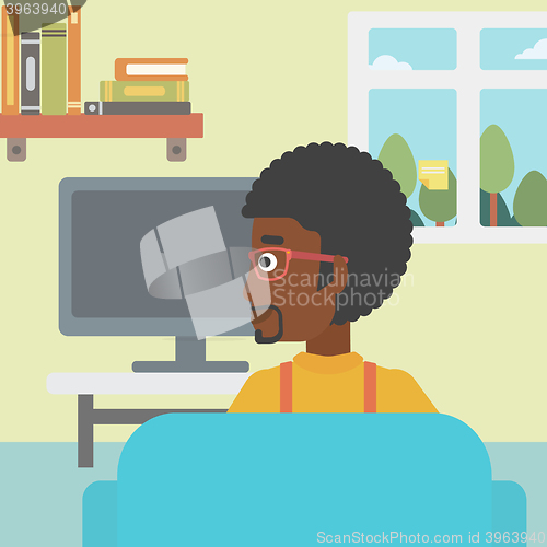 Image of Man watching TV.