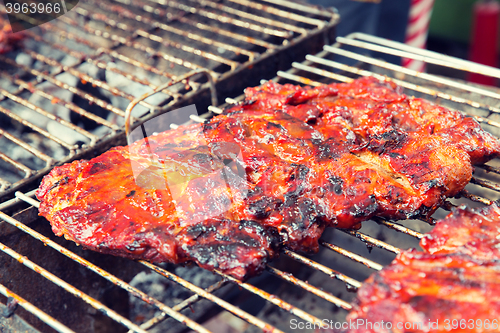 Image of meat grill at street market