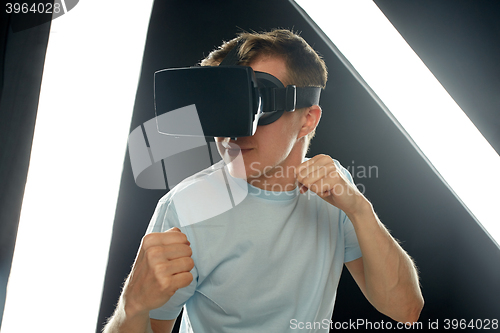 Image of man in virtual reality headset or 3d glasses