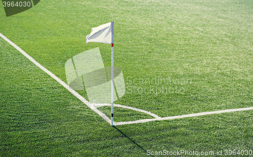 Image of close up of football field corner with flag marker