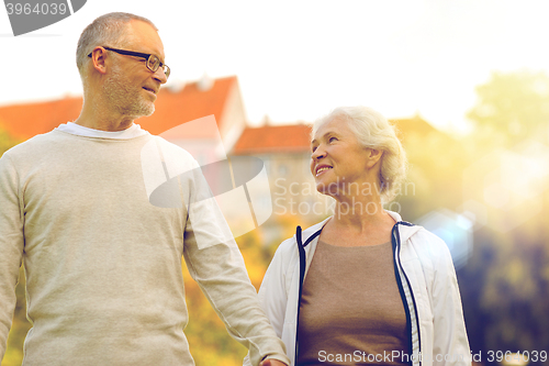 Image of senior couple in city park