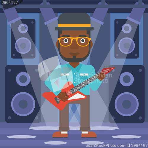 Image of Musician playing electric guitar.