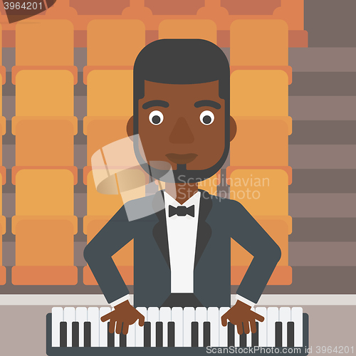 Image of Musician playing piano.