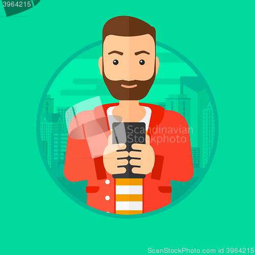 Image of Man using smartphone.