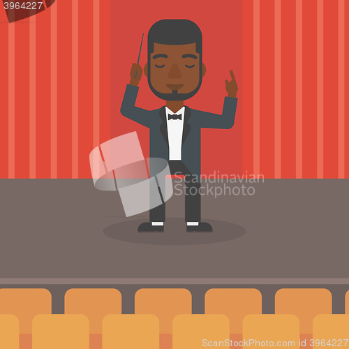 Image of Conductor directing with baton.