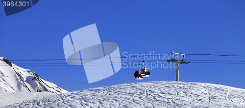 Image of Panoramic view on gondola lift and ski slope