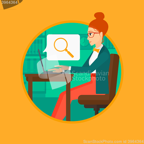 Image of Business woman working on her laptop.