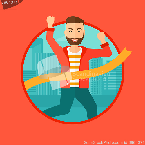Image of Businessman crossing finish line.