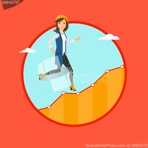 Image of Business woman running upstairs.